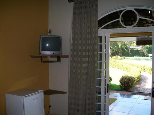 Imagen de la habitación del Hotel Pousada Chal&eacute; Das Flores. Foto 8