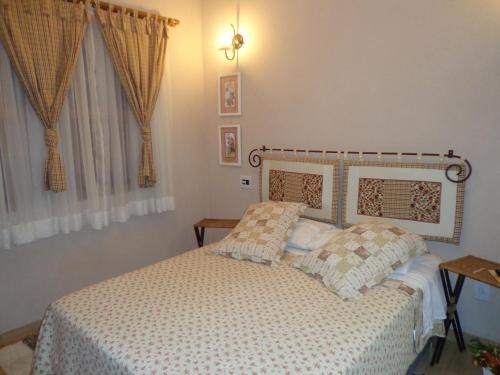 Imagen de la habitación del Hotel Pousada Chal&eacute; Das Flores. Foto 10