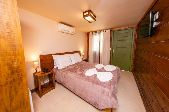 Imagen de la habitación del Hotel Pousada Charm Canela. Foto 5