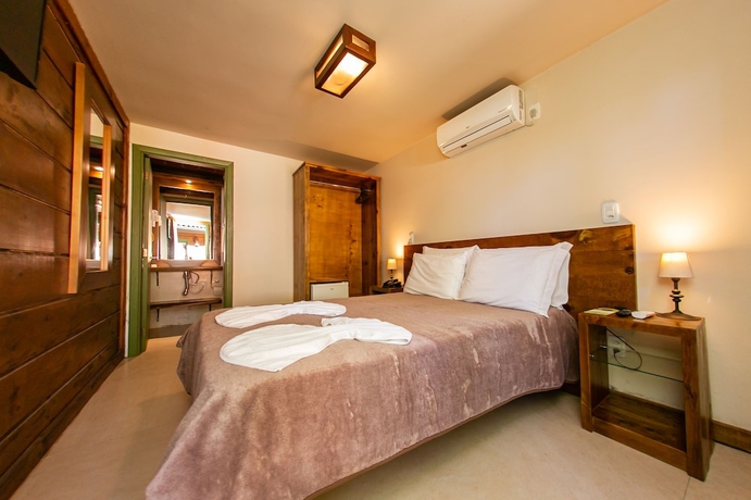 Imagen de la habitación del Hotel Pousada Charm Canela. Foto 10