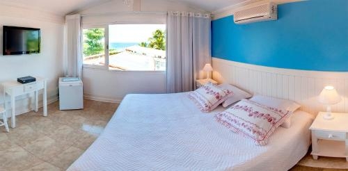 Imagen de la habitación del Hotel Pousada Chez Louise Et Louis P&eacute; Na Areia. Foto 8