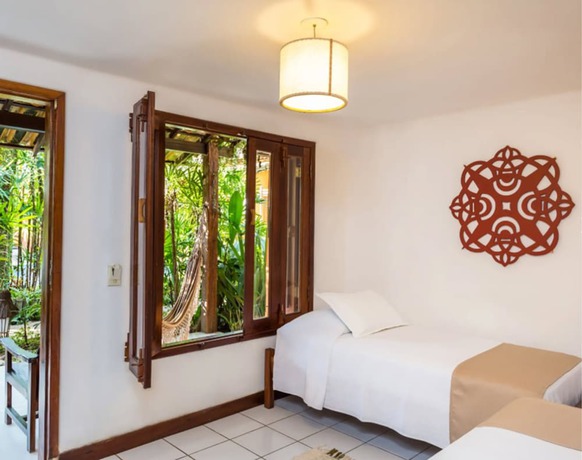 Imagen de la habitación del Hotel Pousada Coqueiros. Foto 3