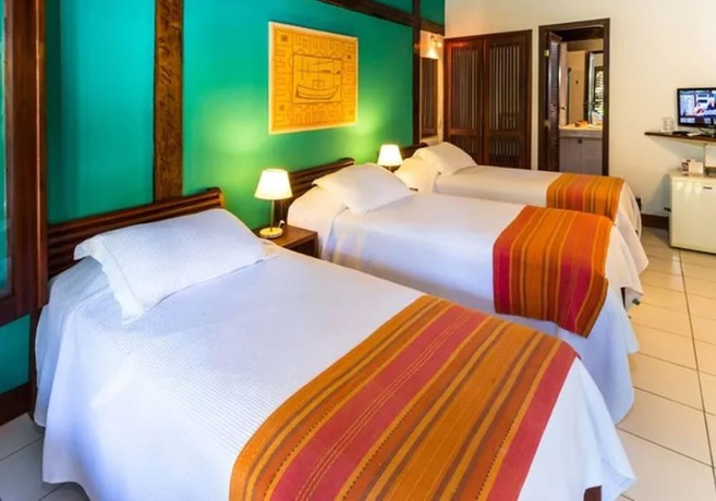 Imagen de la habitación del Hotel Pousada Coqueiros. Foto 9