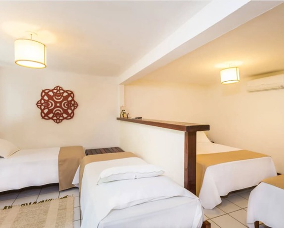 Imagen de la habitación del Hotel Pousada Coqueiros. Foto 13