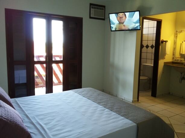 Imagen de la habitación del Hotel Pousada Coral de Fogo. Foto 13