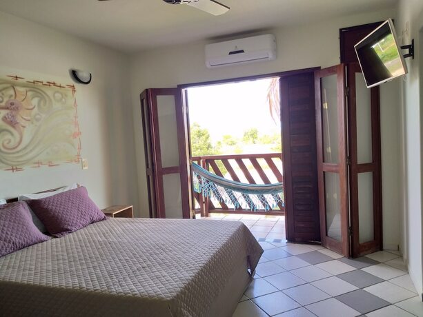 Imagen de la habitación del Hotel Pousada Coral de Fogo. Foto 17