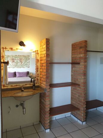 Imagen de la habitación del Hotel Pousada Coral de Fogo. Foto 18