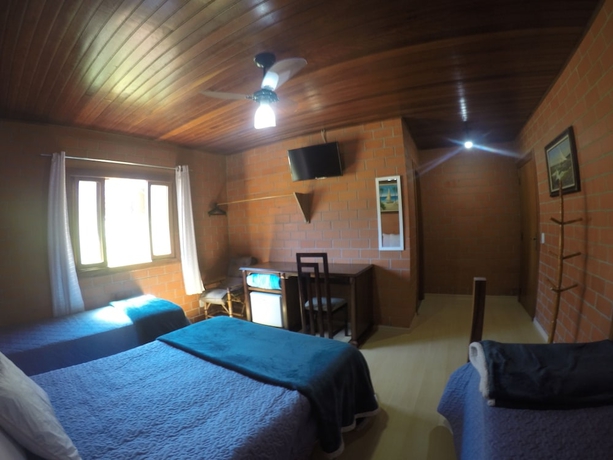 Imagen de la habitación del Hotel Pousada Cravo and Canela, Campos do Jordao. Foto 9