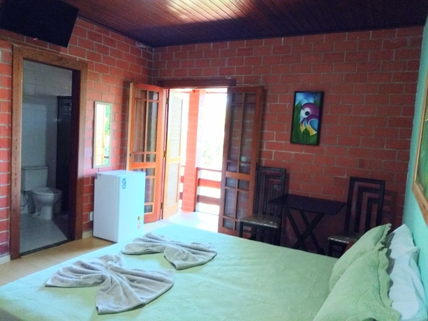 Imagen de la habitación del Hotel Pousada Cravo and Canela, Campos do Jordao. Foto 11