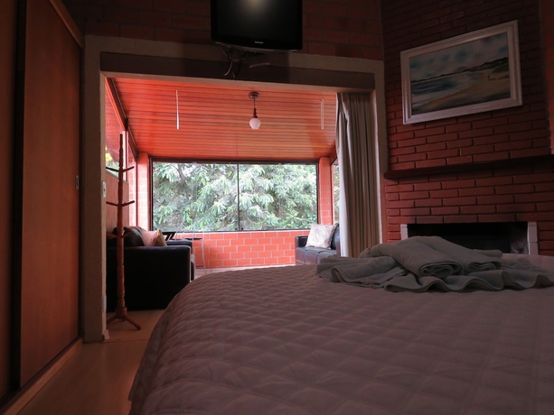 Imagen de la habitación del Hotel Pousada Cravo and Canela, Campos do Jordao. Foto 13