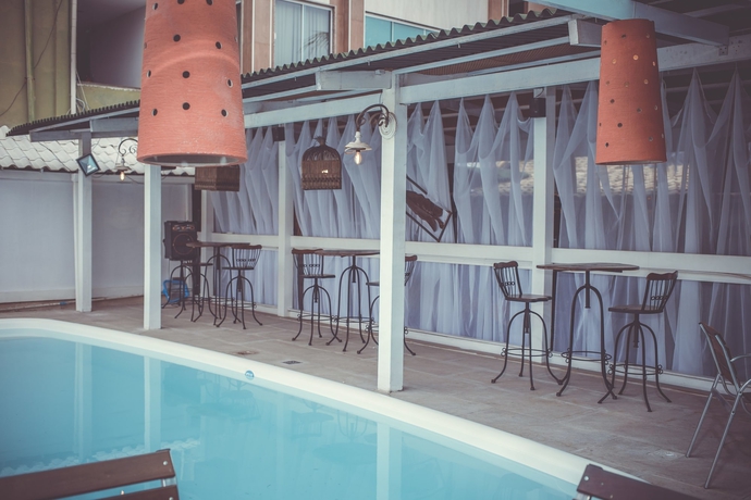 Imagen de la piscina del Hotel Pousada Cravo and Canela. Foto 19