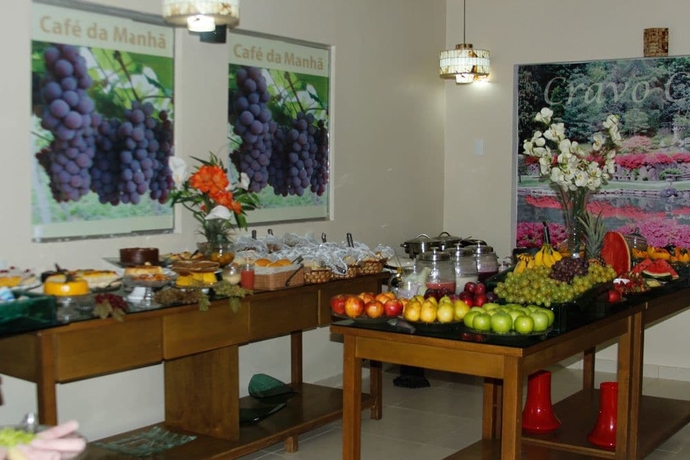 Imagen del bar/restaurante del Hotel Pousada Cravo and Canela. Foto 10