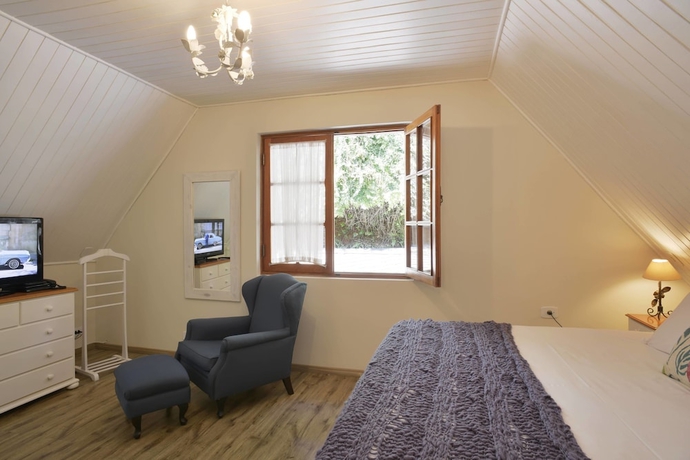 Imagen de la habitación del Hotel Pousada Da Pedra, Campos do Jordao. Foto 16