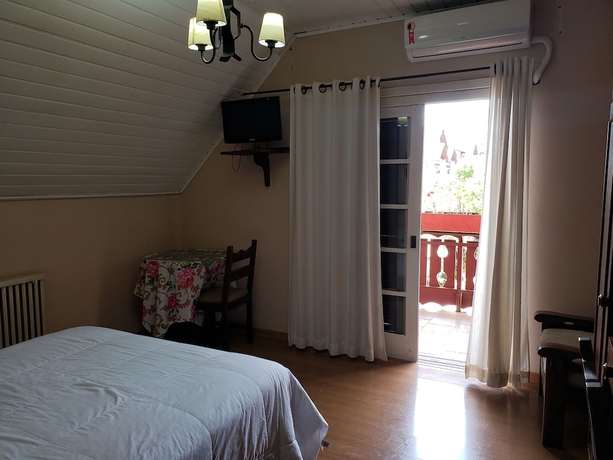 Imagen de la habitación del Hotel Pousada Das Flores, Gramado. Foto 3