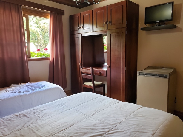 Imagen de la habitación del Hotel Pousada Das Flores, Gramado. Foto 5