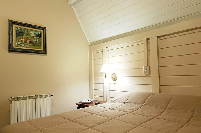 Imagen de la habitación del Hotel Pousada Das Flores, Gramado. Foto 7