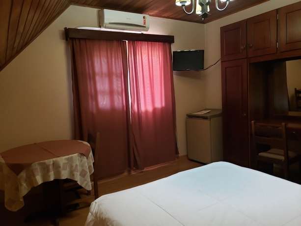 Imagen de la habitación del Hotel Pousada Das Flores, Gramado. Foto 9