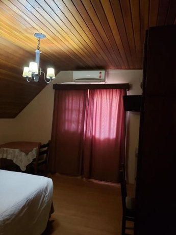 Imagen de la habitación del Hotel Pousada Das Flores, Gramado. Foto 10