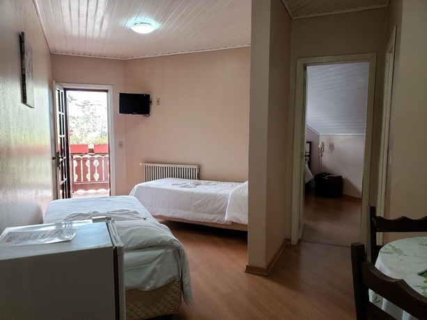 Imagen de la habitación del Hotel Pousada Das Flores, Gramado. Foto 14