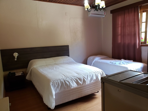 Imagen de la habitación del Hotel Pousada Das Flores, Gramado. Foto 16
