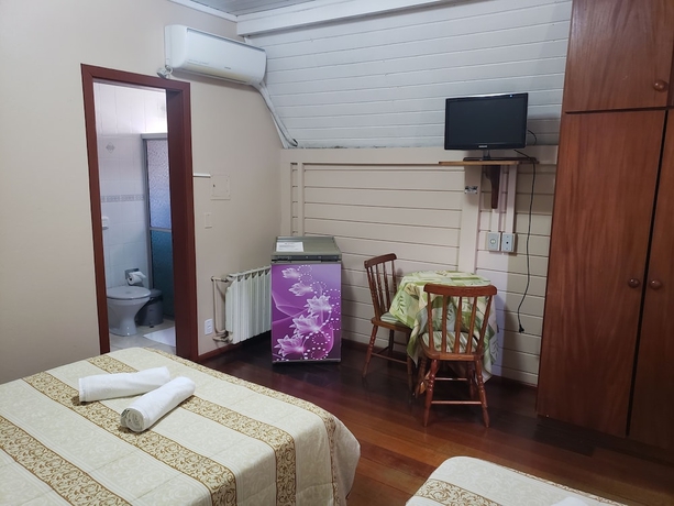Imagen de la habitación del Hotel Pousada Das Flores, Gramado. Foto 17
