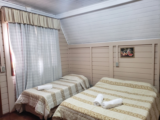 Imagen de la habitación del Hotel Pousada Das Flores, Gramado. Foto 18