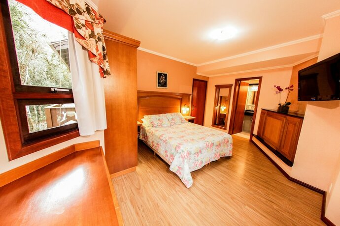 Imagen de la habitación del Hotel Pousada Das Papoulas, Gramado. Foto 32