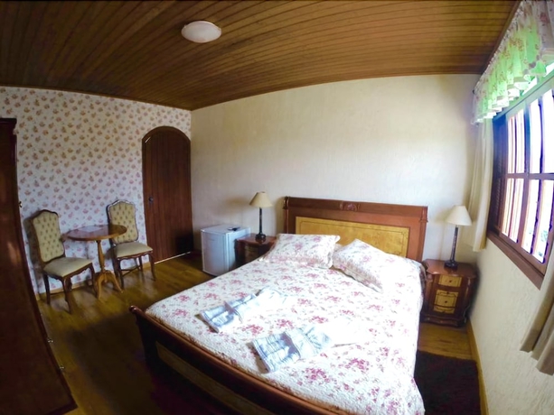 Imagen de la habitación del Hotel Pousada Das Rosas, Campos do Jordao. Foto 4