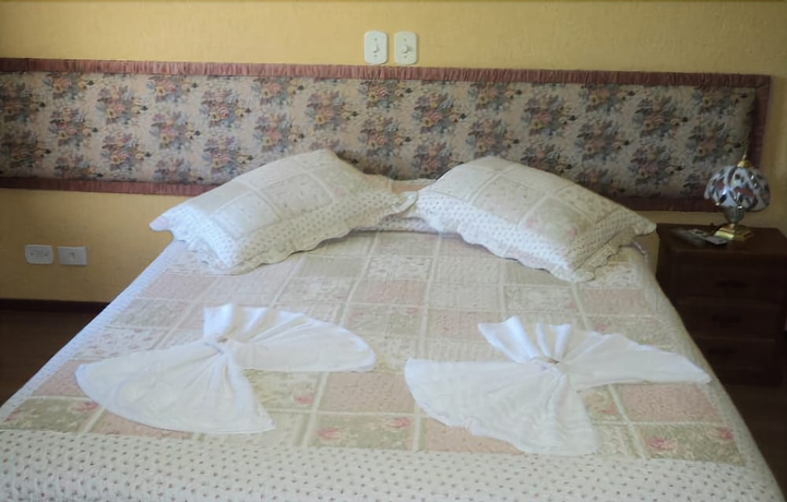 Imagen de la habitación del Hotel Pousada Das Rosas, Campos do Jordao. Foto 8