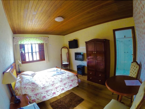 Imagen de la habitación del Hotel Pousada Das Rosas, Campos do Jordao. Foto 10