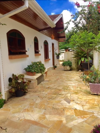 Imagen de la habitación del Hotel Pousada Das Rosas, Campos do Jordao. Foto 11
