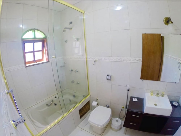 Imagen de la habitación del Hotel Pousada Das Rosas, Campos do Jordao. Foto 13
