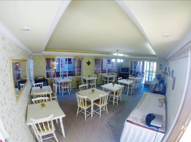 Imagen del bar/restaurante del Hotel Pousada Das Rosas, Campos do Jordao. Foto 3