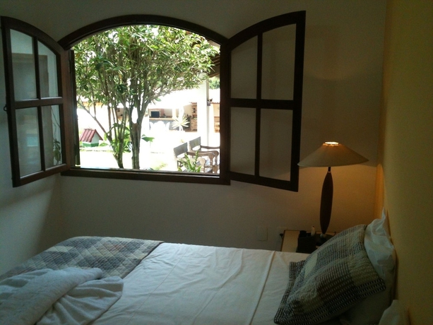 Imagen de la habitación del Hotel Pousada Doce Vida Guarapari. Foto 17