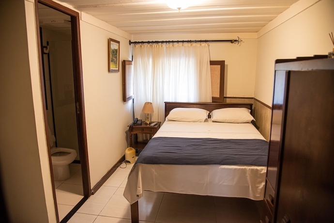 Imagen de la habitación del Hotel Pousada Dom Petr&oacute;polis. Foto 8
