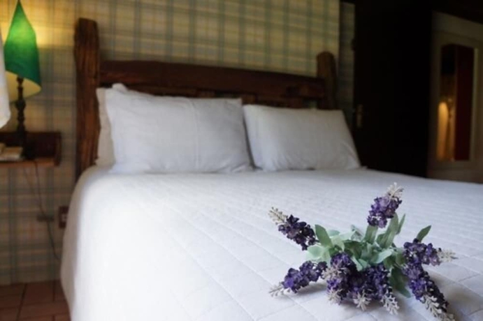 Imagen de la habitación del Hotel Pousada Don Ramon and Spa Holgar D'Alma - Charm Collection. Foto 5