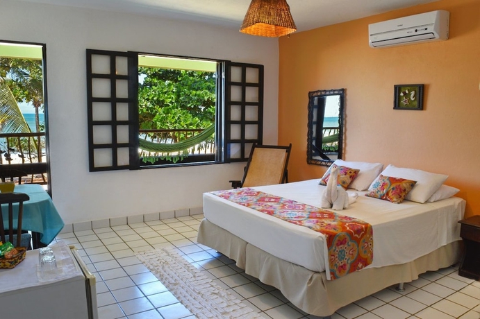 Imagen de la habitación del Hotel Pousada Dos Coqueiros. Foto 9