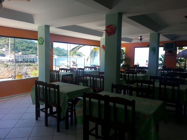 Imagen del bar/restaurante del Hotel Pousada Dos Golfinhos, Angra Do Reis. Foto 3