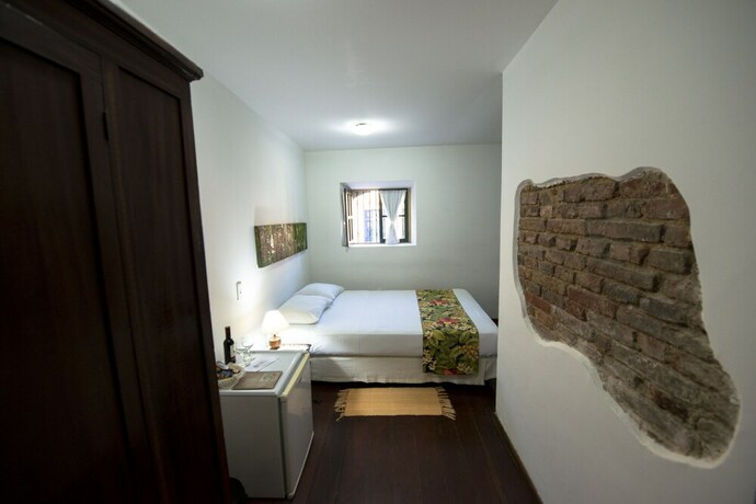 Imagen de la habitación del Hotel Pousada Dos Quatro Cantos. Foto 16