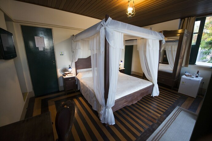 Imagen de la habitación del Hotel Pousada Dos Quatro Cantos. Foto 18