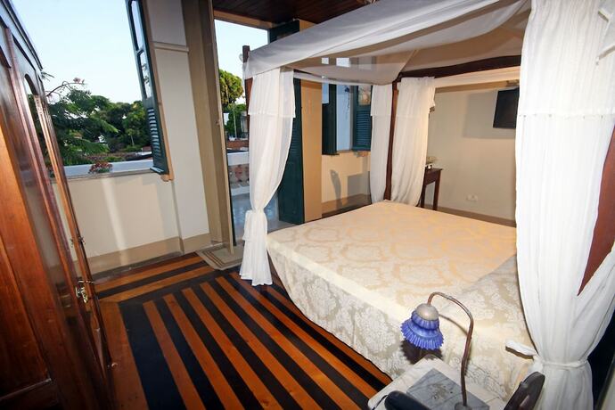 Imagen de la habitación del Hotel Pousada Dos Quatro Cantos. Foto 29