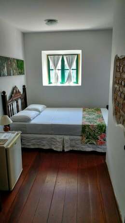 Imagen de la habitación del Hotel Pousada Dos Quatro Cantos. Foto 31