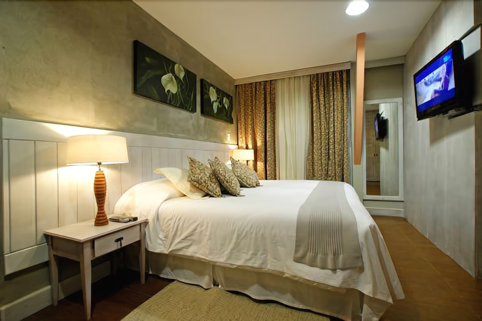 Imagen de la habitación del Hotel Pousada Dotto Chateau. Foto 4