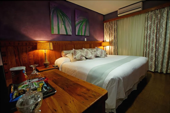 Imagen de la habitación del Hotel Pousada Dotto Chateau. Foto 12