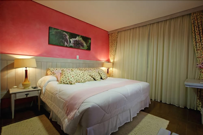 Imagen de la habitación del Hotel Pousada Dotto Chateau. Foto 15