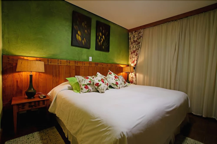 Imagen de la habitación del Hotel Pousada Dotto Chateau. Foto 16
