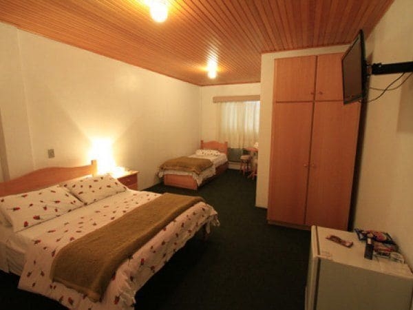 Imagen de la habitación del Hotel Pousada Encantos De Gramado. Foto 6