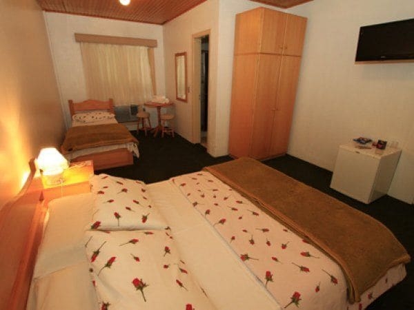 Imagen de la habitación del Hotel Pousada Encantos De Gramado. Foto 9