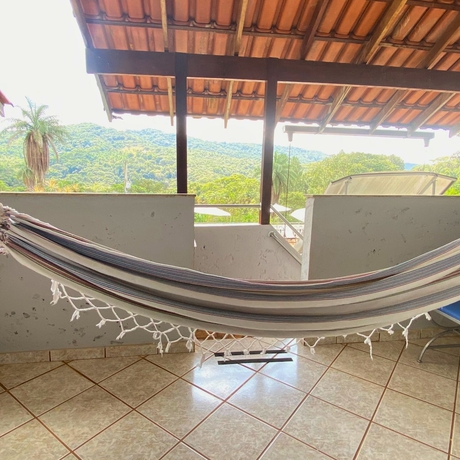 Imagen de la habitación del Hotel Pousada Encantos da Serra Macacos. Foto 4