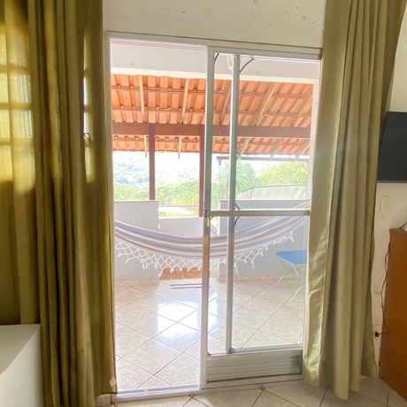 Imagen de la habitación del Hotel Pousada Encantos da Serra Macacos. Foto 9